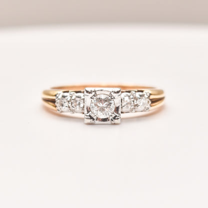 14K two-tone gold diamond engagement ring with a .25 carat brilliant center stone and side diamonds, size 9 US, displayed on a white background.