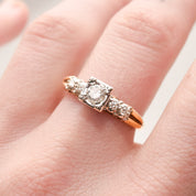 14K Two-Tone Gold Diamond Engagement Ring with 0.25 Carat Brilliant Center Stone, Size 9 on a Woman's Finger