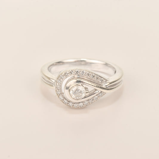 Estate 10K diamond halo engagement ring size 6.75 US on a white background