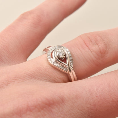 Estate 10K Diamond Halo Engagement Ring Size 6.75 displayed on a finger