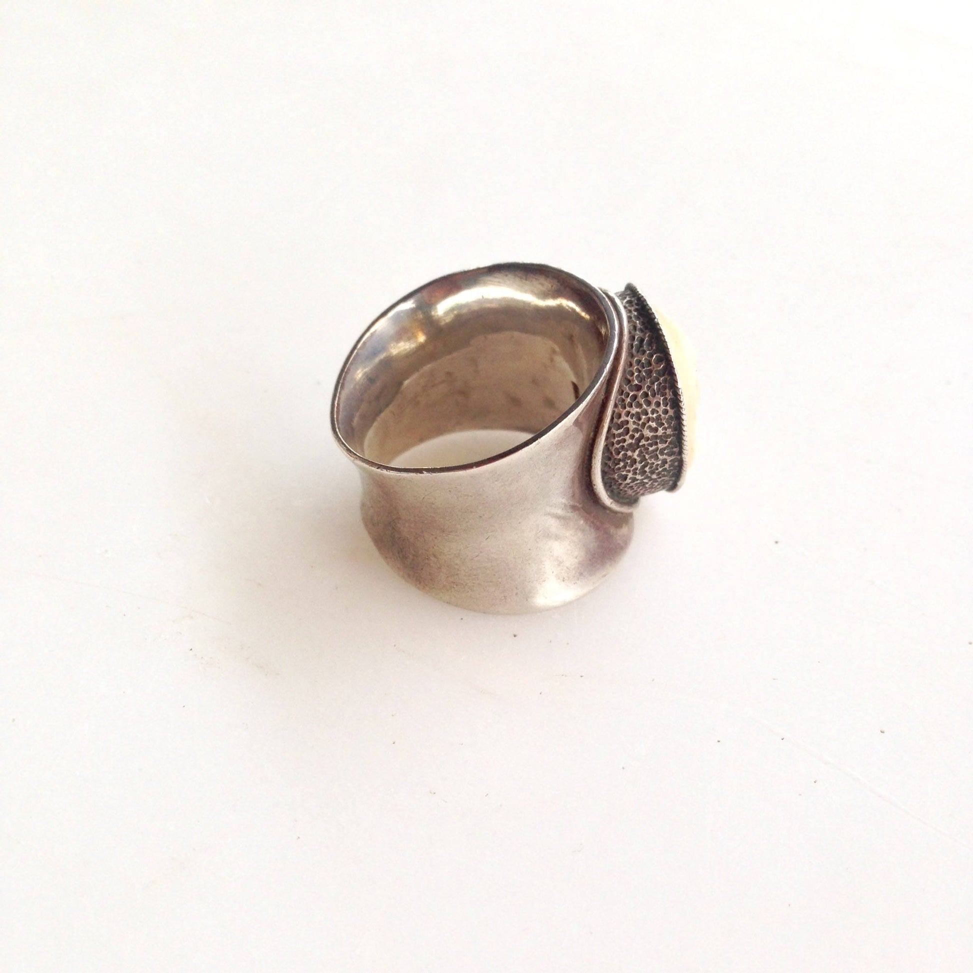 Vintage silver happy face moon ring with textured details on band