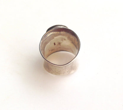 Vintage sterling silver ring featuring a happy moon face design