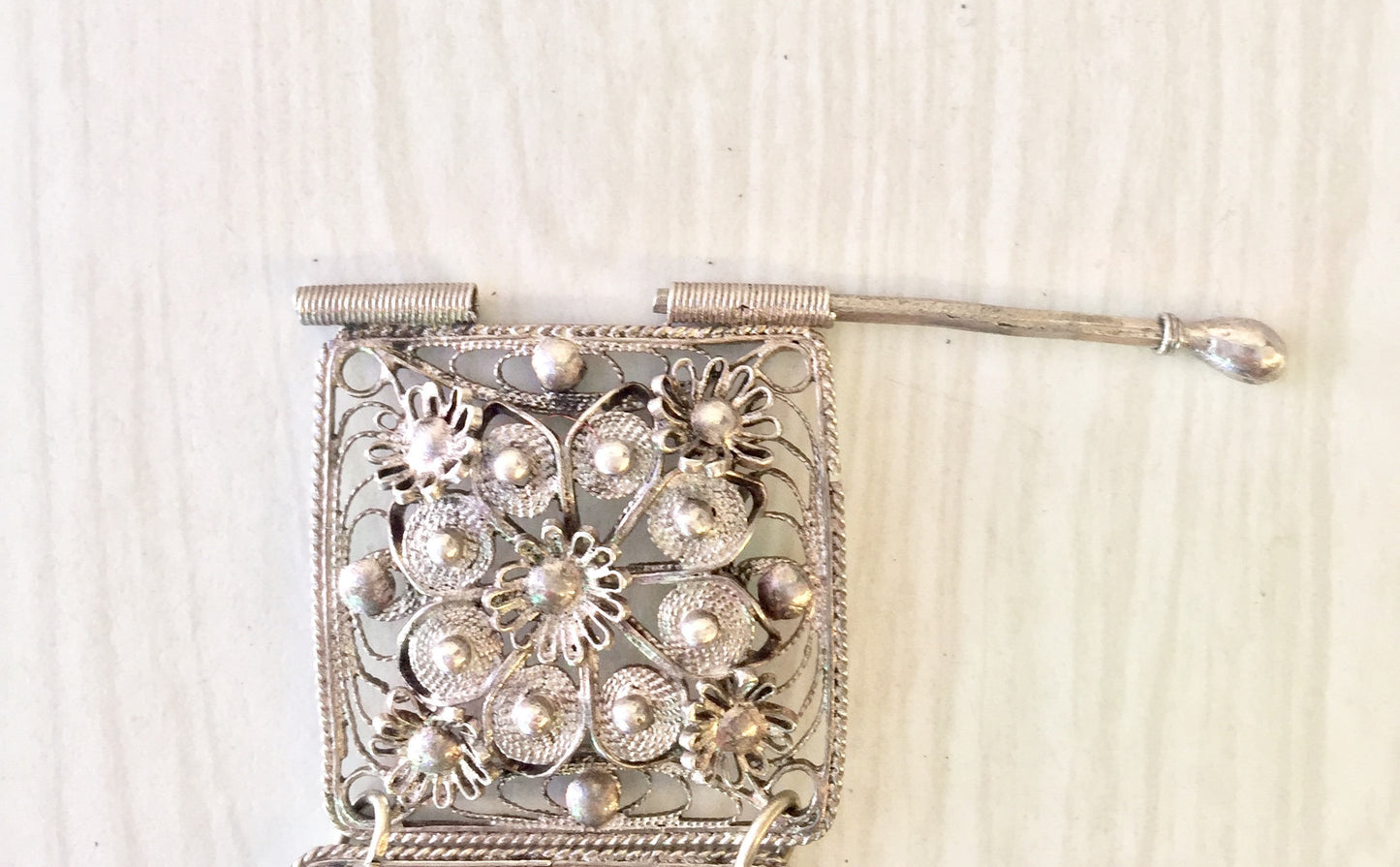 Vintage sterling silver filigree link bracelet with intricate floral design, perfect as a gift for her on any holiday occasion.