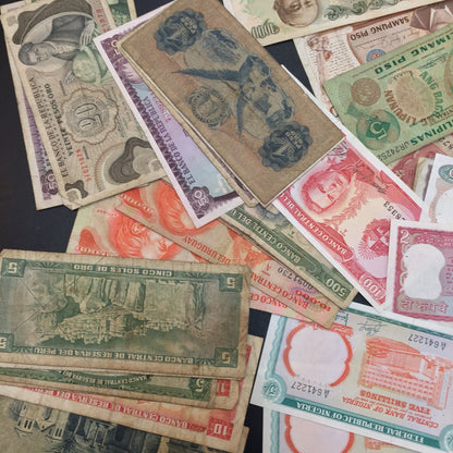 Vintage foreign paper currency banknotes from various countries for scrapbooking and crafting