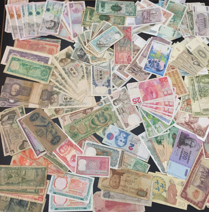 Large collection of vintage foreign paper currency and banknotes from various countries, ideal for scrapbooking, crafts and collecting old authentic money.