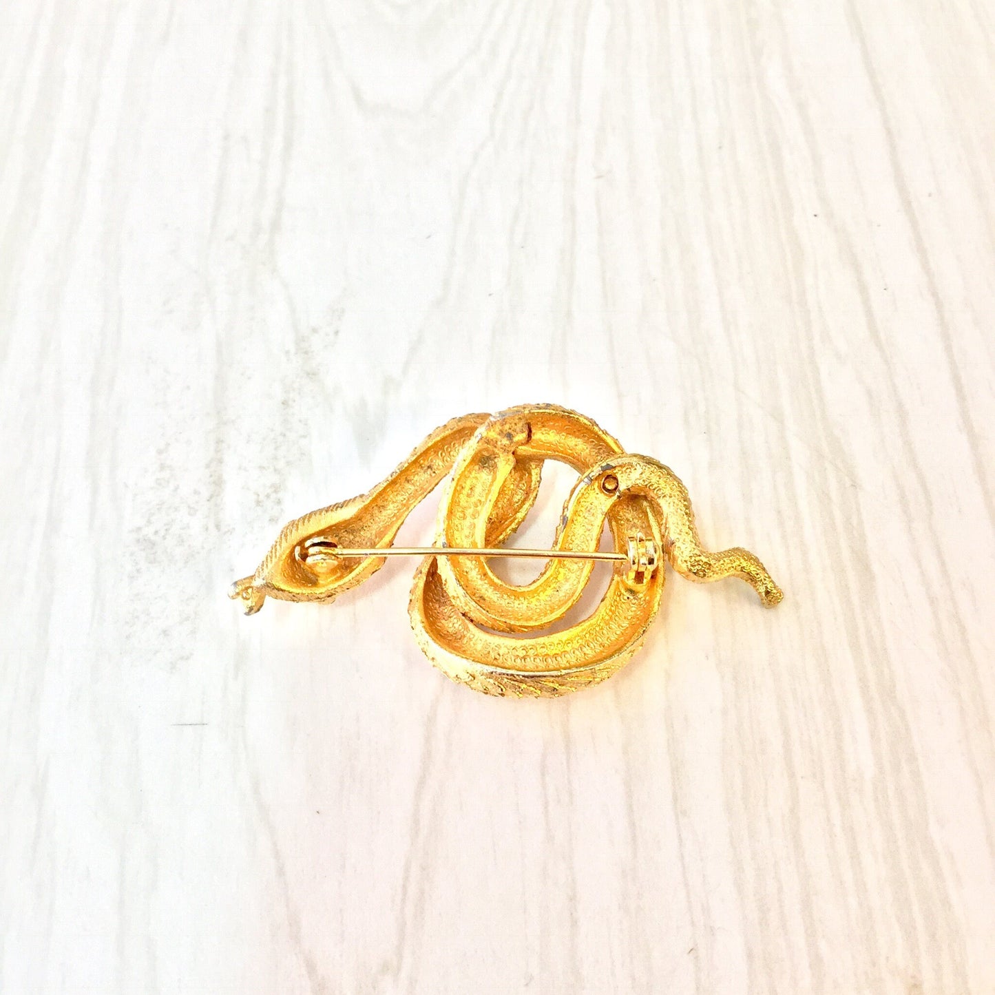 Gold tone coiled snake brooch pin, vintage costume jewelry snake accessory for a boho holiday gift idea