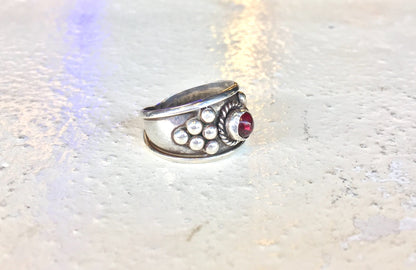 Vintage sterling silver ring with red garnet gemstone in Celtic gothic style