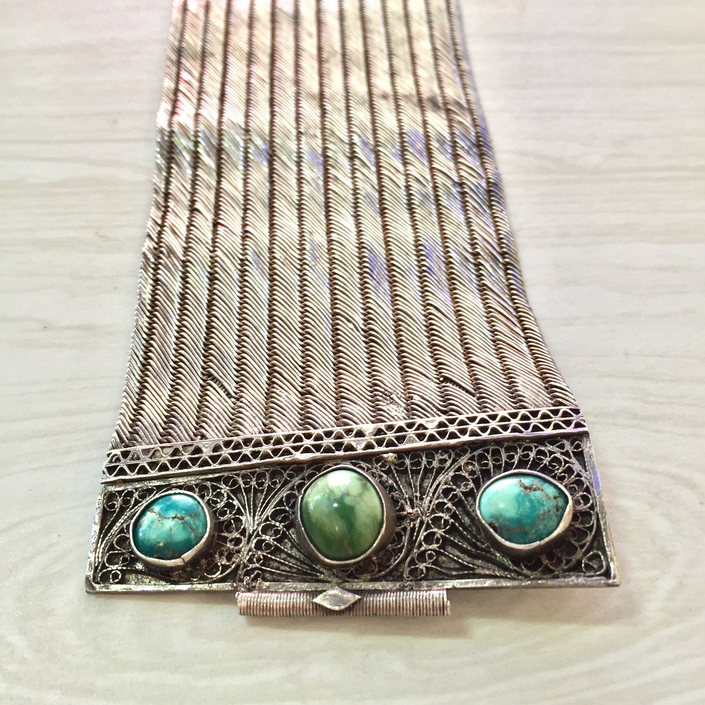 Antique sterling silver statement bracelet with intricate filigree design and three turquoise cabochon stones, Middle Eastern ethnic jewelry gift idea