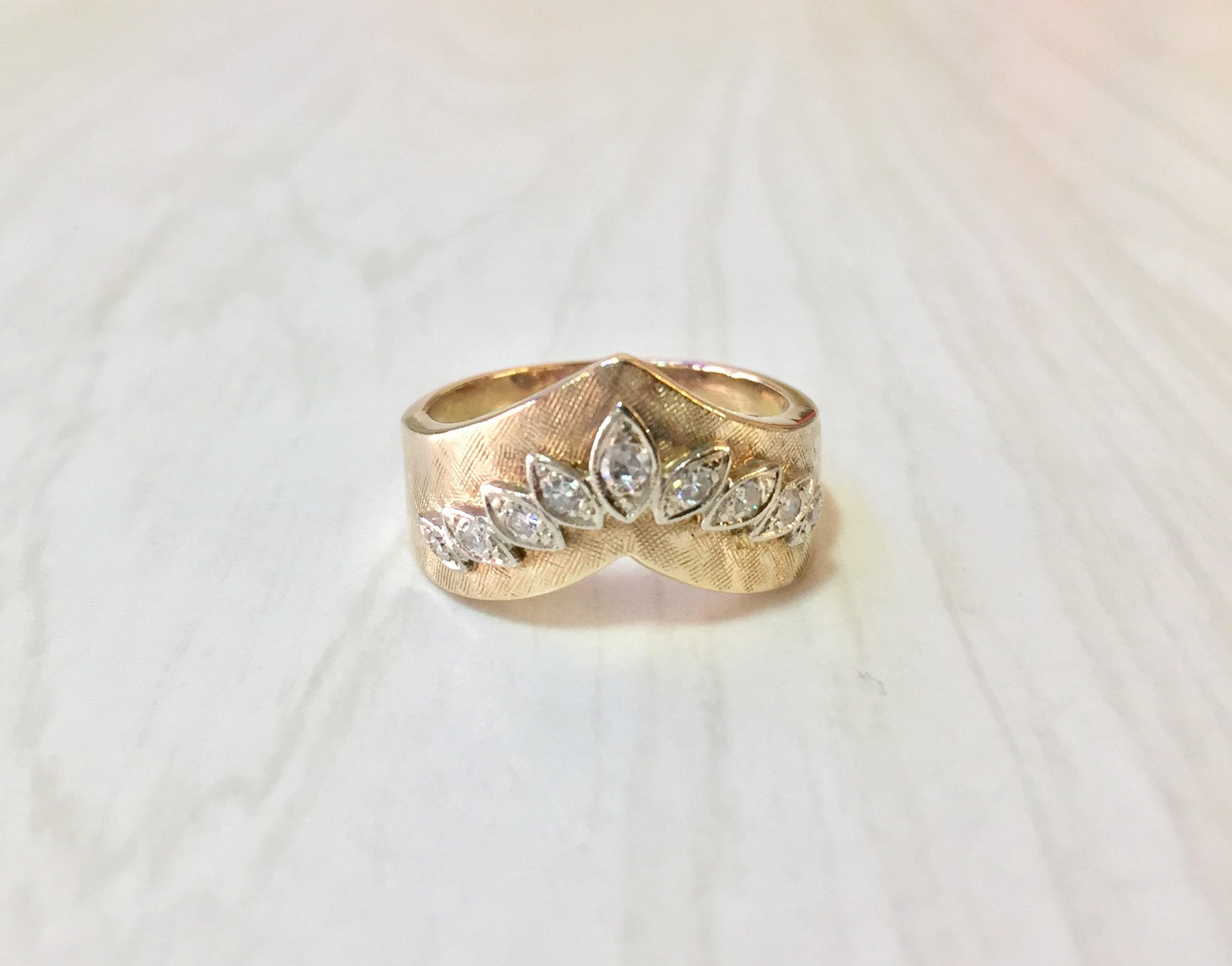 14K yellow gold V-shaped stackable ring with diamond accents