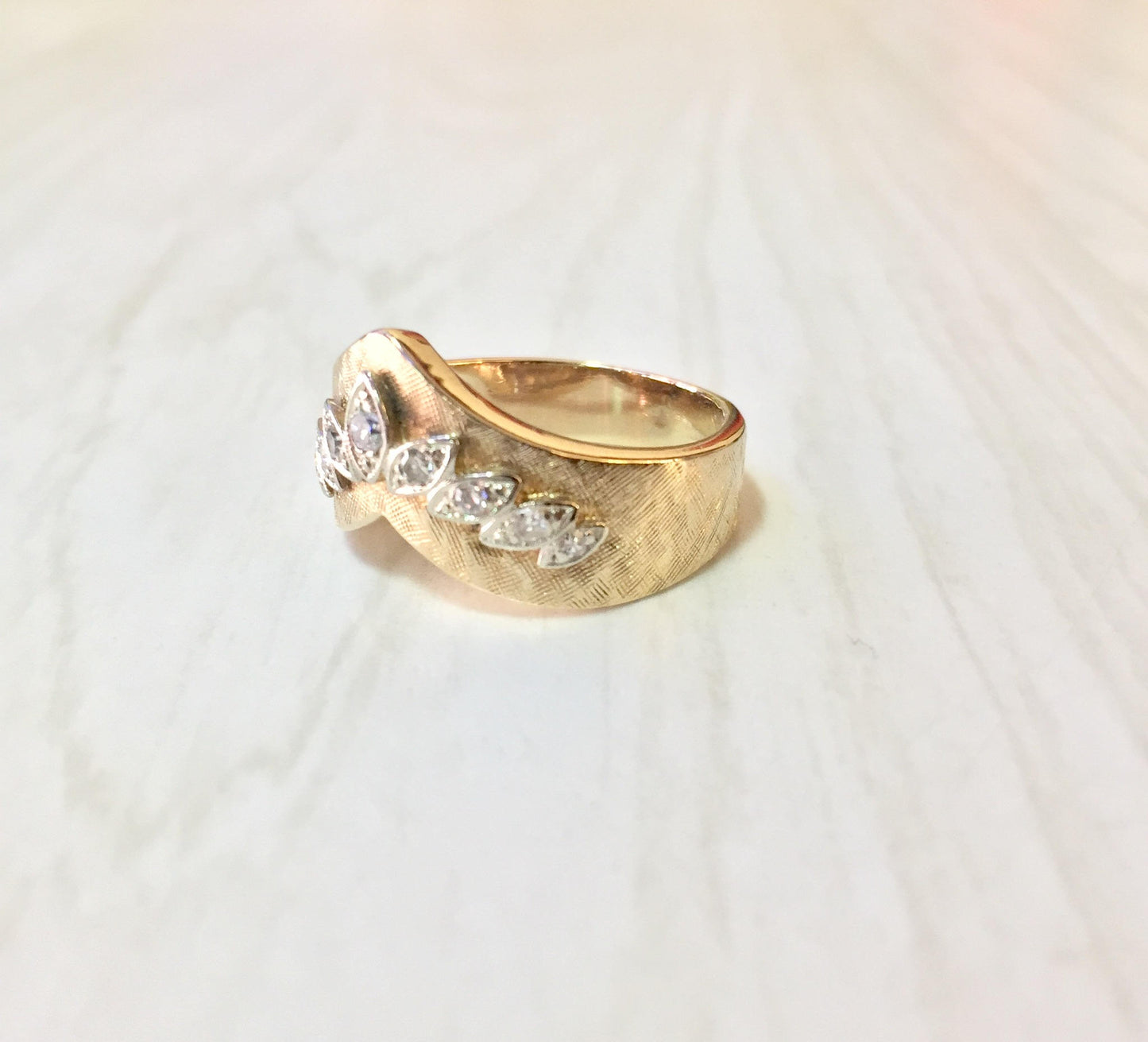 14K yellow gold chevron V-shaped stackable engagement ring with diamonds