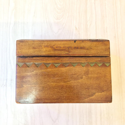 Vintage wooden box with hand-carved geometric pattern and patina finish