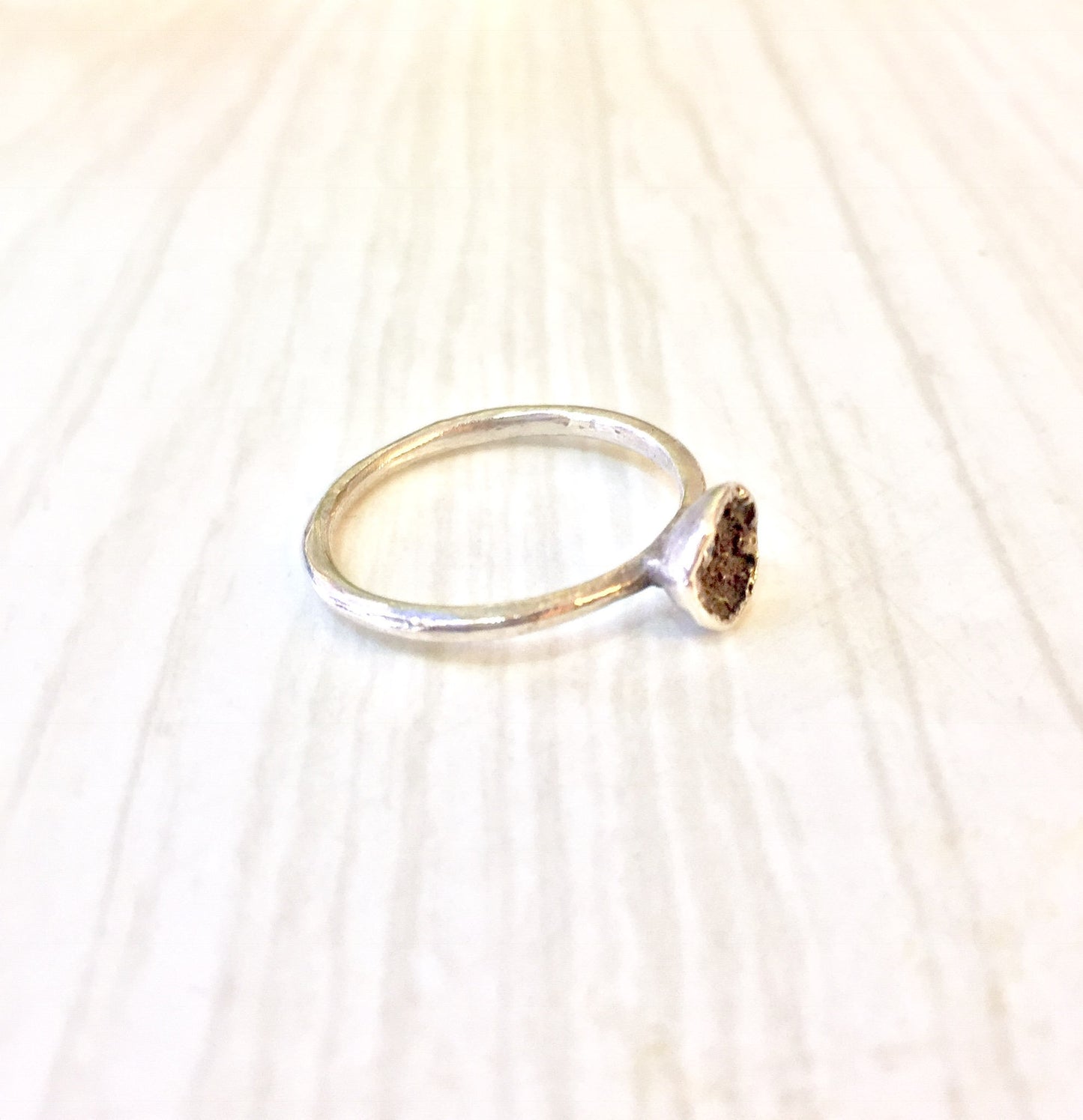 Vintage sterling silver ring with a brown diamond stone on a light wooden surface, perfect as an engagement ring, promise ring or gift for her.