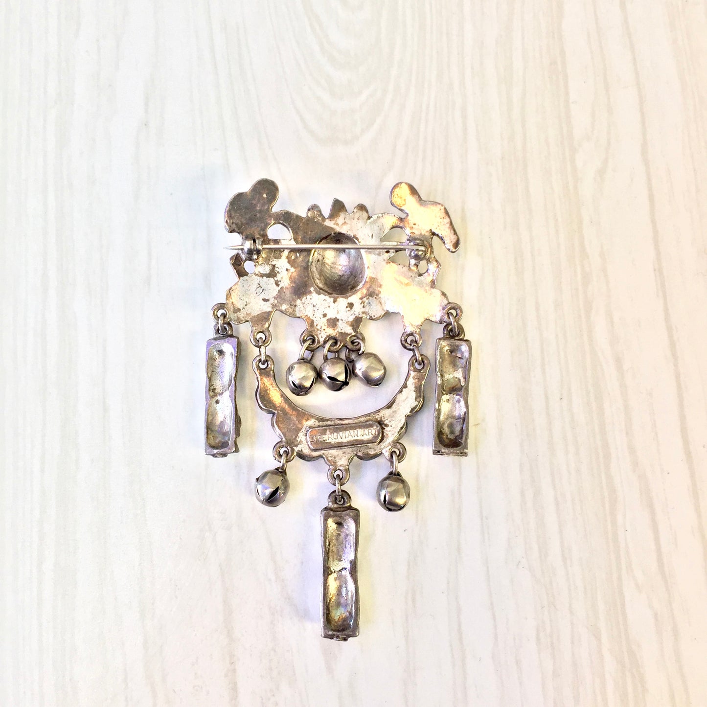 Vintage silver tone Peruvian style brooch pin with dangling charms and gemstones, statement costume jewelry piece