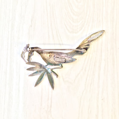 Vintage sterling silver bird brooch pin crafted by Italian designer Guglielmo Cini for Gump's, featuring detailed metalwork depicting a perched bird with spread wings and tail feathers.