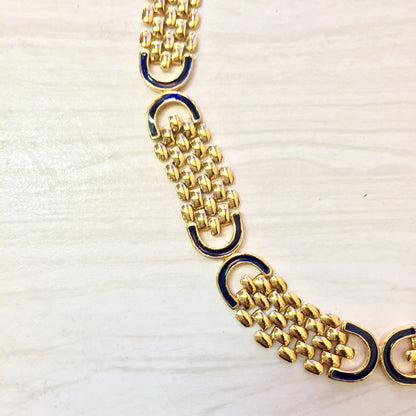 Vintage gold tone chain link statement necklace with dark blue accents, elegant jewelry gift idea