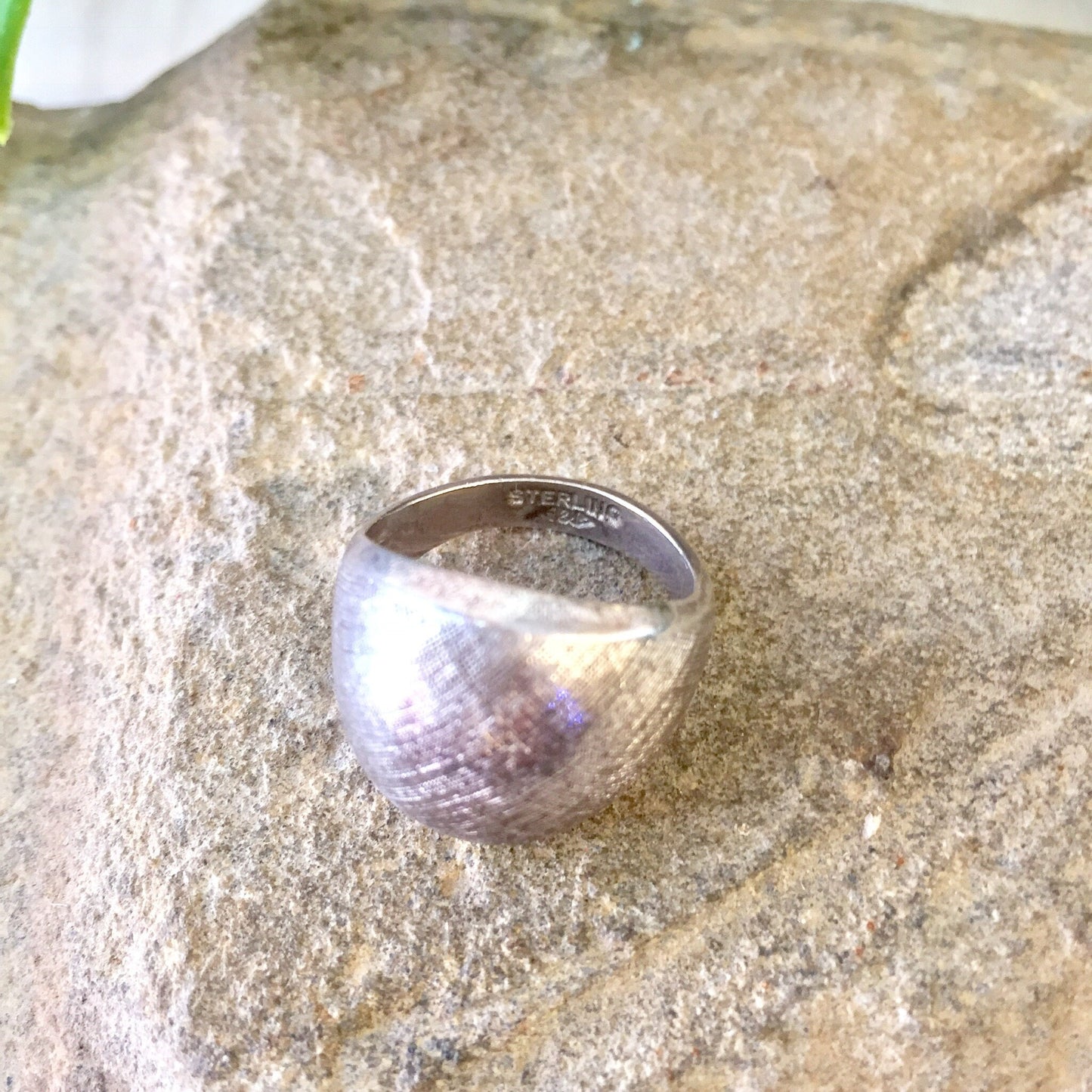 Vintage sterling silver textured pinky ring on stone surface, small statement jewelry gift for Mother's Day or mom