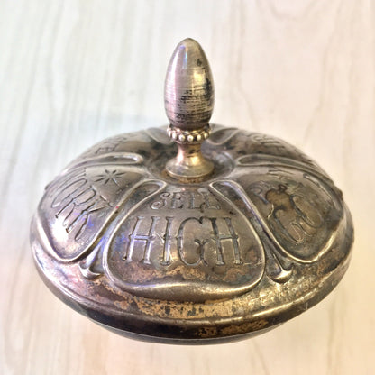 Antique sterling silver and ebony spinning top toy by Gorham, engraved with "Gorham Mfg. Co." and "HiCel", a collectible game or fortune-telling device from the early 20th century.