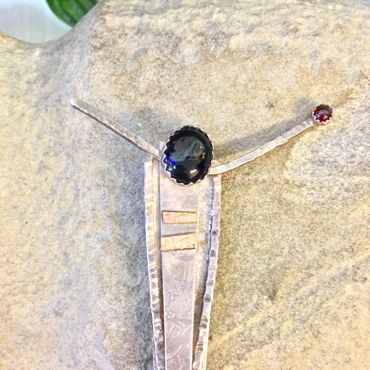 Vintage sterling silver abstract brooch pin with black onyx and red stone accents, featuring textured metal design. Large statement jewelry piece suitable as a unique gift.