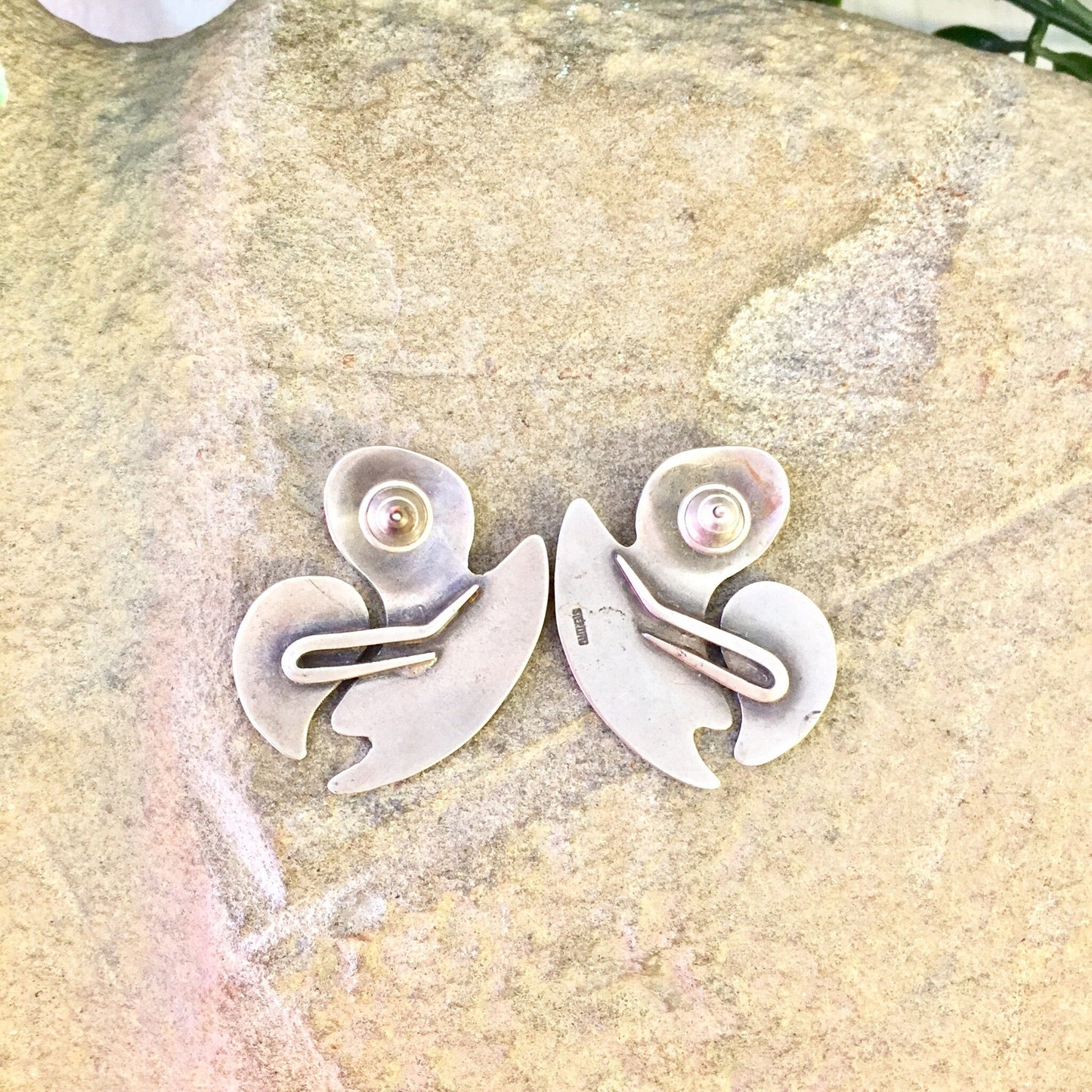 Vintage sterling silver abstract statement earrings on stone background, perfect gift idea for mom or Mother's Day