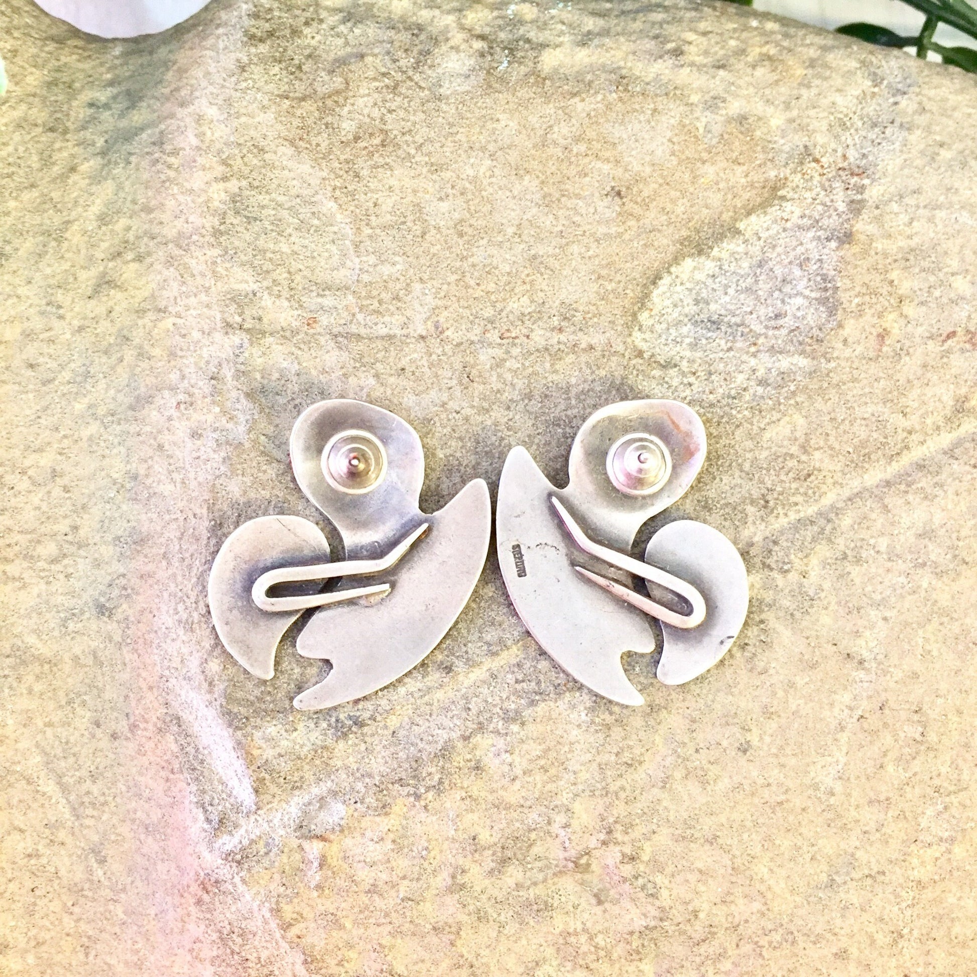 Vintage sterling silver abstract statement earrings on stone background, perfect gift idea for mom or Mother's Day