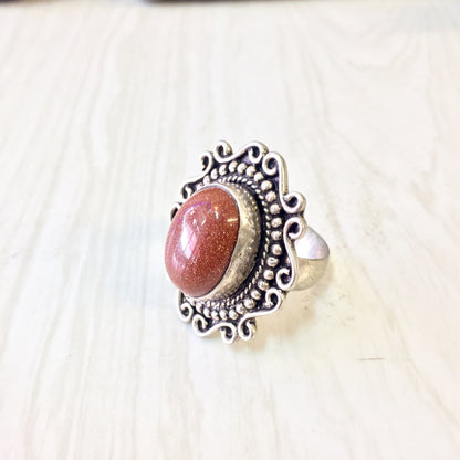 Vintage sterling silver statement ring with orange druzy quartz stone and intricate Celtic design