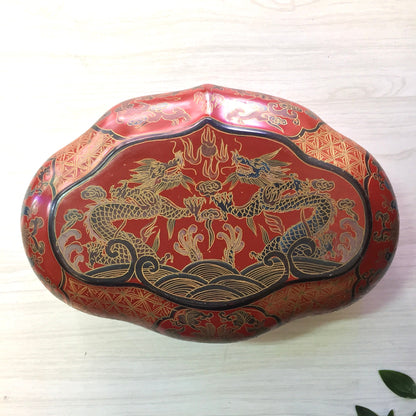 Vintage Asian red laminated box featuring gold and blue dragon design, suitable for storing jewelry, trinkets or serving as a catch-all dish.