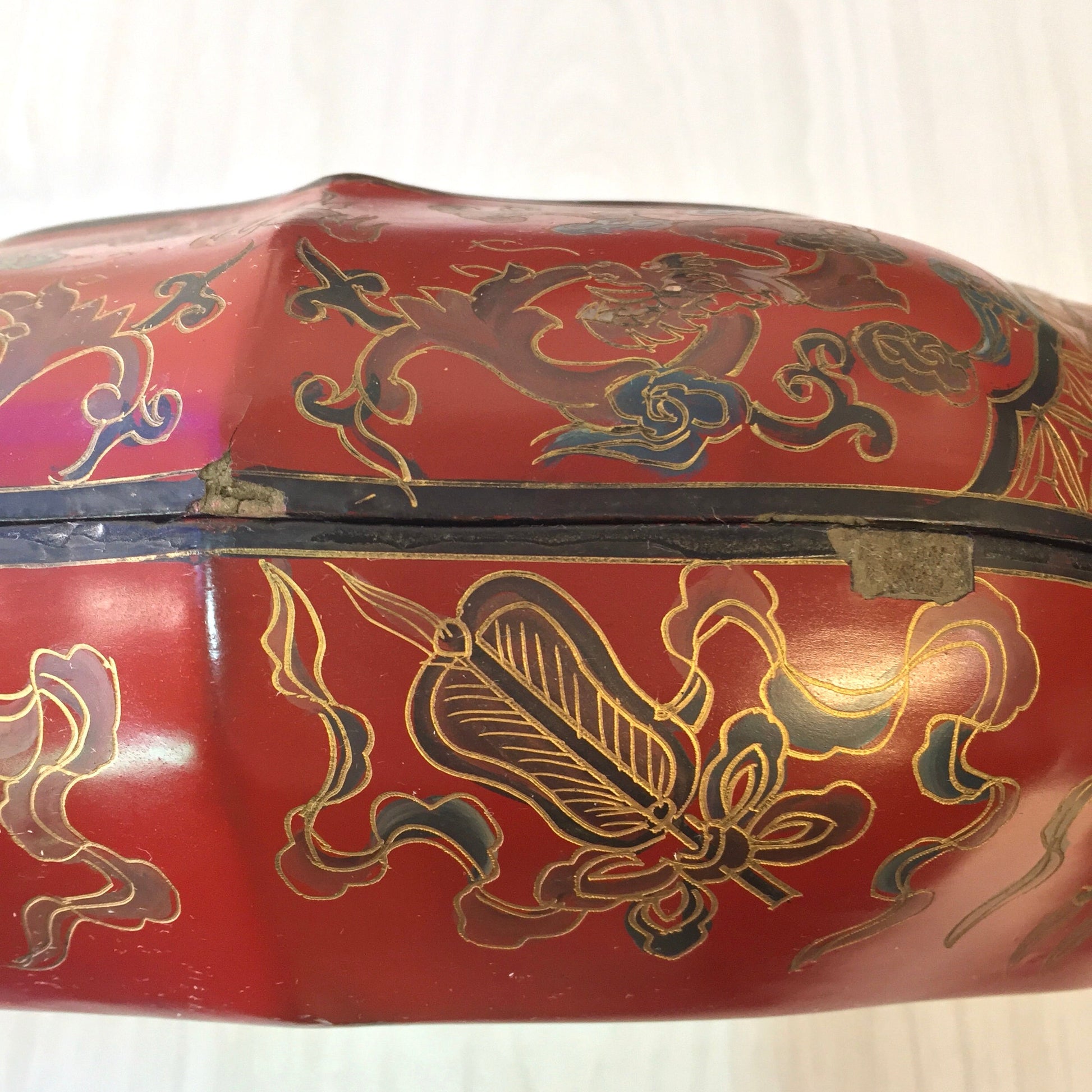 Vintage Asian red laminated box with blue and gold dragon and floral motifs, lidded trinket or jewelry box for storage or display of Asian art