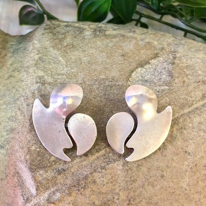 Vintage sterling silver abstract statement earrings on stone surface with greenery, perfect as a Mother's Day gift or gift for mom.