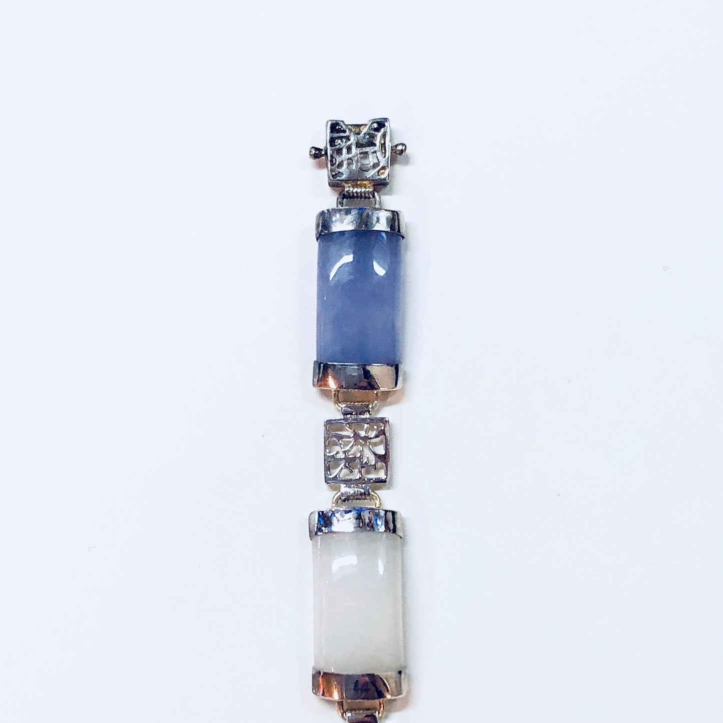 Vintage sterling silver link bracelet with natural jade stones in shades of blue, white, purple, orange and red