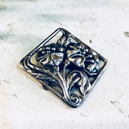 Vintage Dancraft Sterling Silver Floral Brooch Pin featuring blooming flowers design from the 1940s era jewelry.