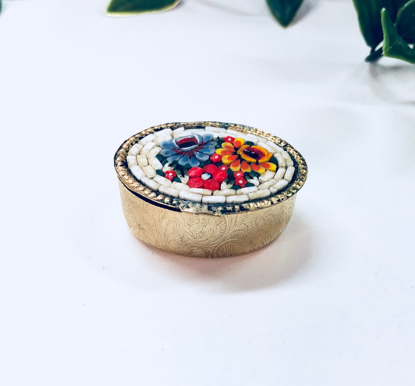 Vintage gold-toned millefiori pill box with swirl mosaic design in red, blue, orange and white colors, small trinket case