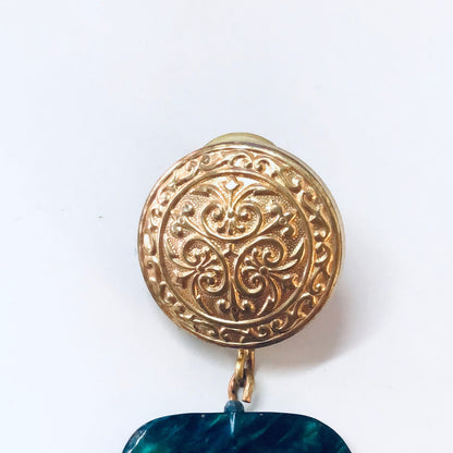 Round gold-tone vintage dangle earrings with intricate floral design and green marble-like accent, for pierced ears