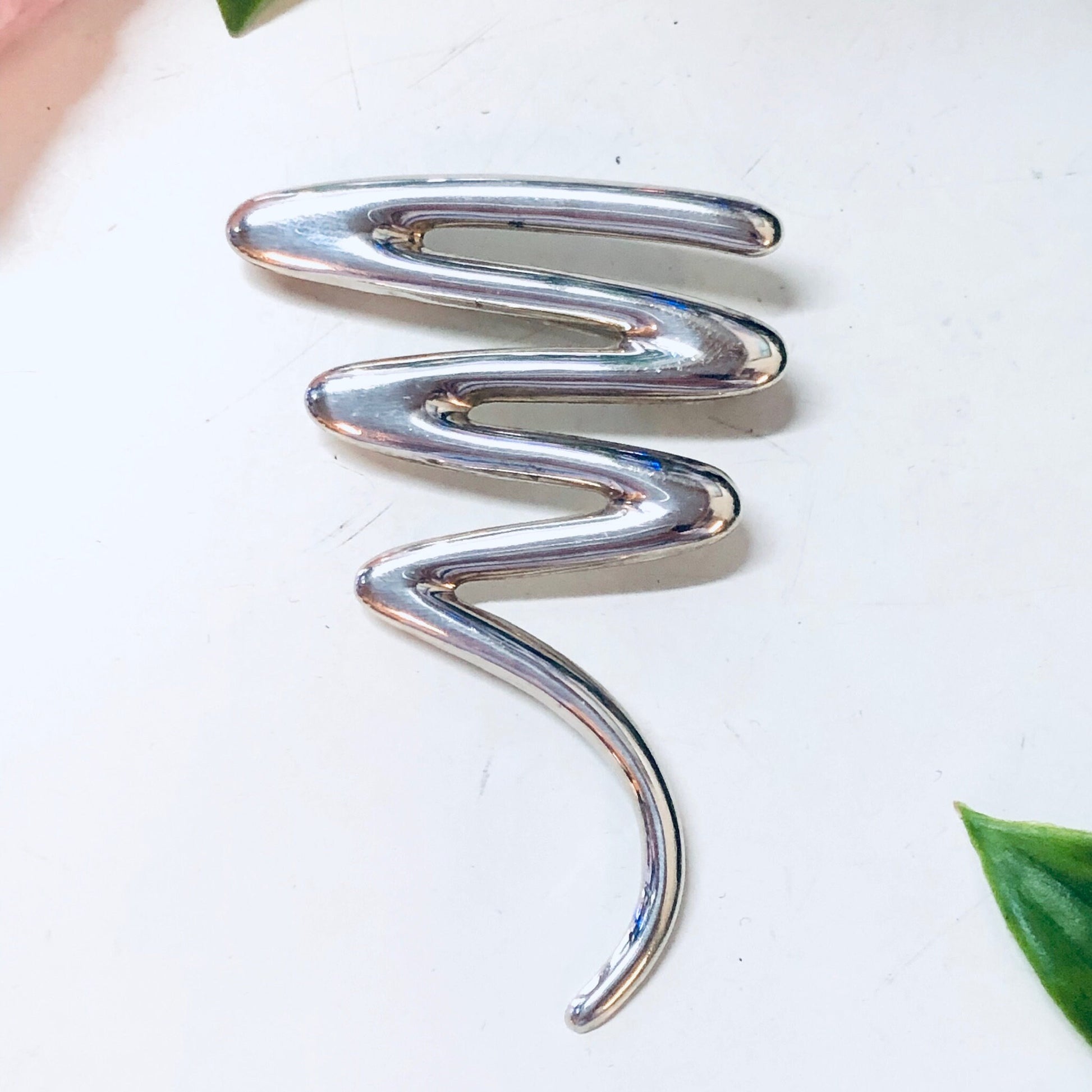 Vintage sterling silver squiggle brooch pin with abstract line design, perfect for Valentines Day or as a unique piece of vintage jewelry.