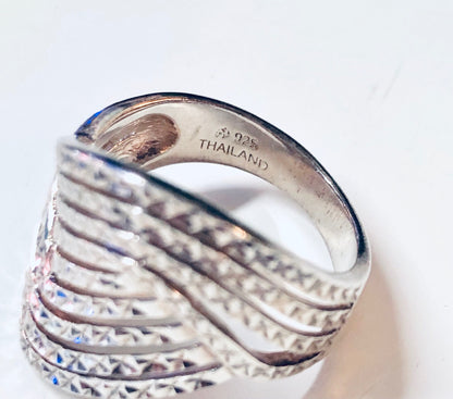 Vintage silver ring with intricate wave design, made in Thailand. 925 sterling silver sparkly statement jewelry.