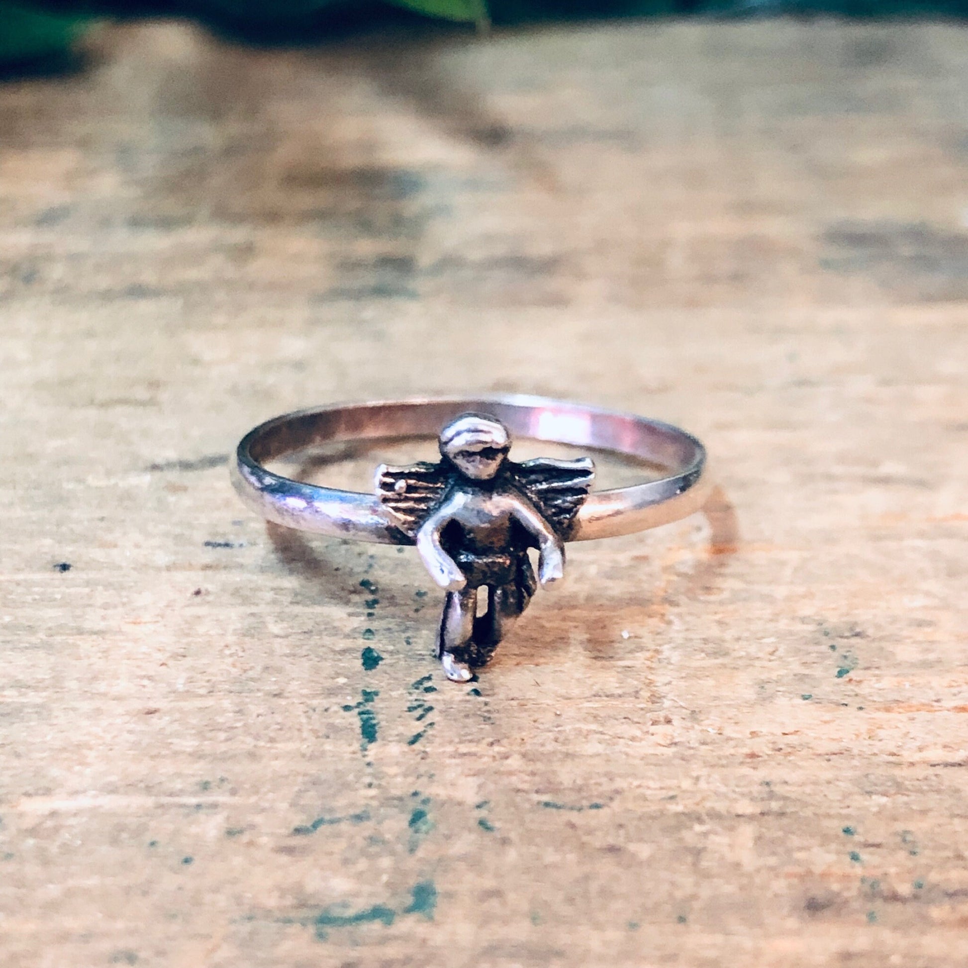 Vintage silver cherub angel ring, handcrafted 925 sterling silver jewelry with detailed angelic figure design, ideal Valentines Day gift or addition to angelic jewelry collection.