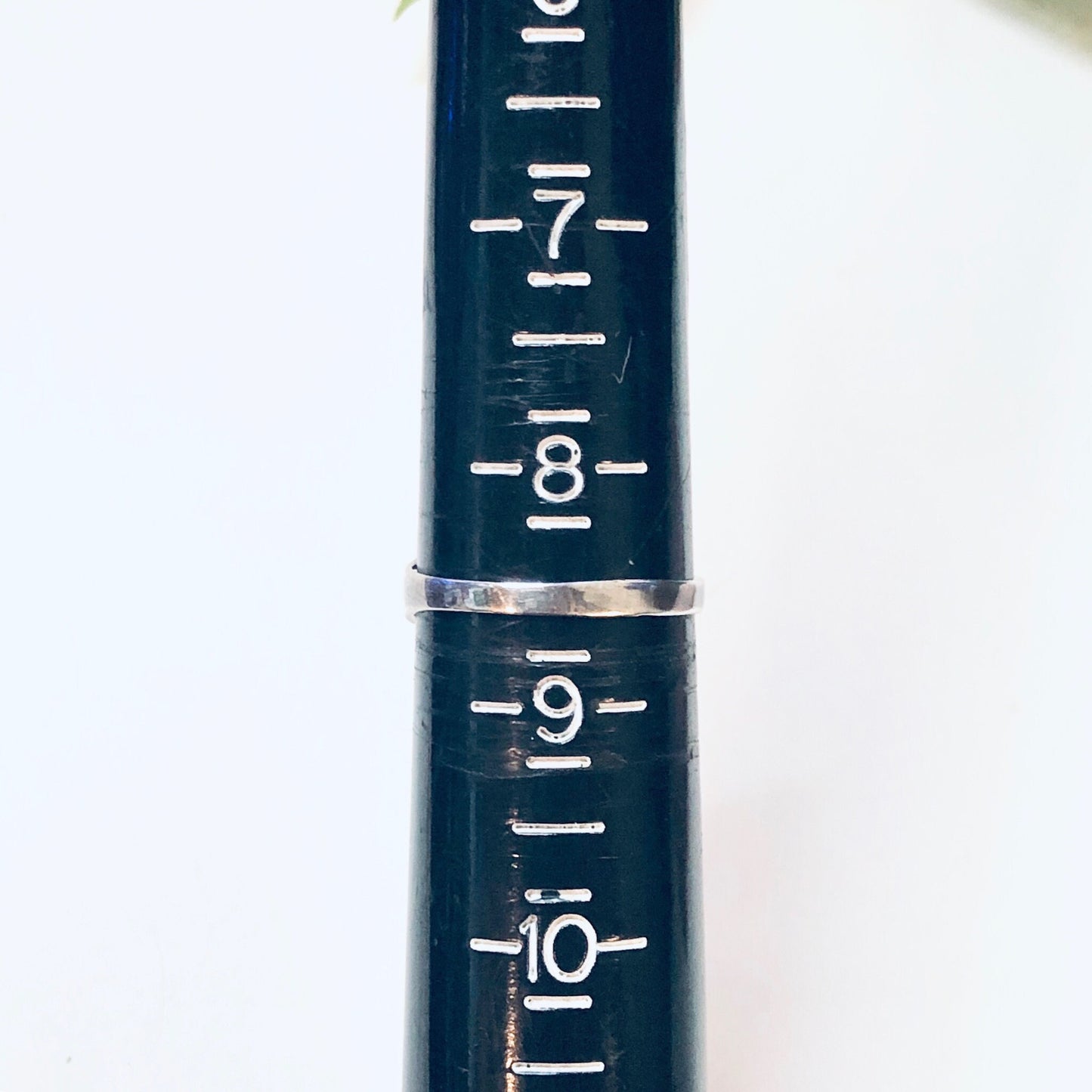 Vintage silver and turquoise stacking ring measuring stick, showing sizes 7 through 10, in boho bohemian style