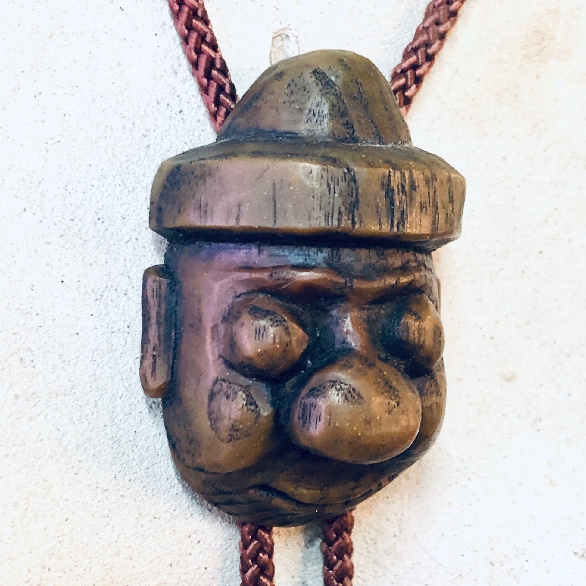 Vintage Japanese wooden carved face bolo tie with rope necklace