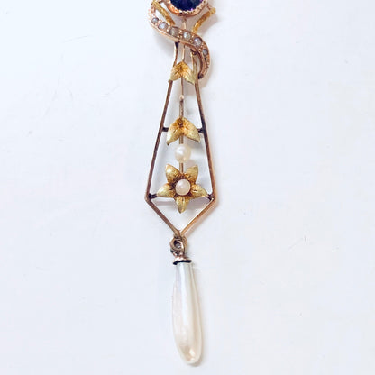 Vintage 14K yellow gold pendant necklace with amethyst stone, pearl drop, and intricate floral design.