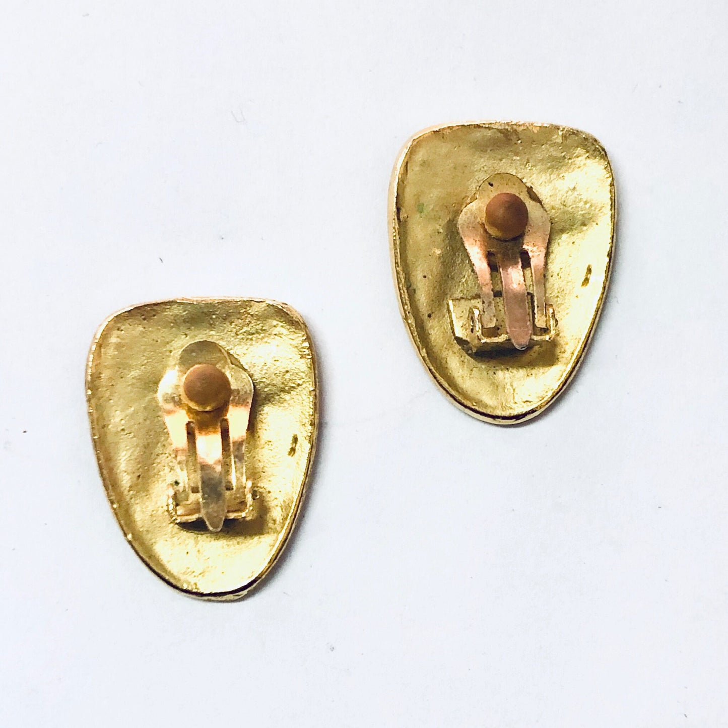 Vintage gold-toned abstract face clip-on earrings, unique mask-inspired jewelry design