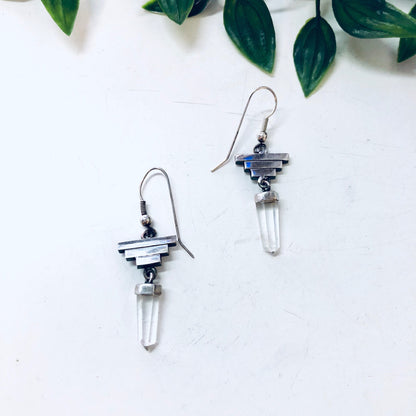 Vintage silver pyramid earrings with clear quartz crystal points. Dangle statement earrings for a bold, eye-catching look. Healing crystal jewelry.