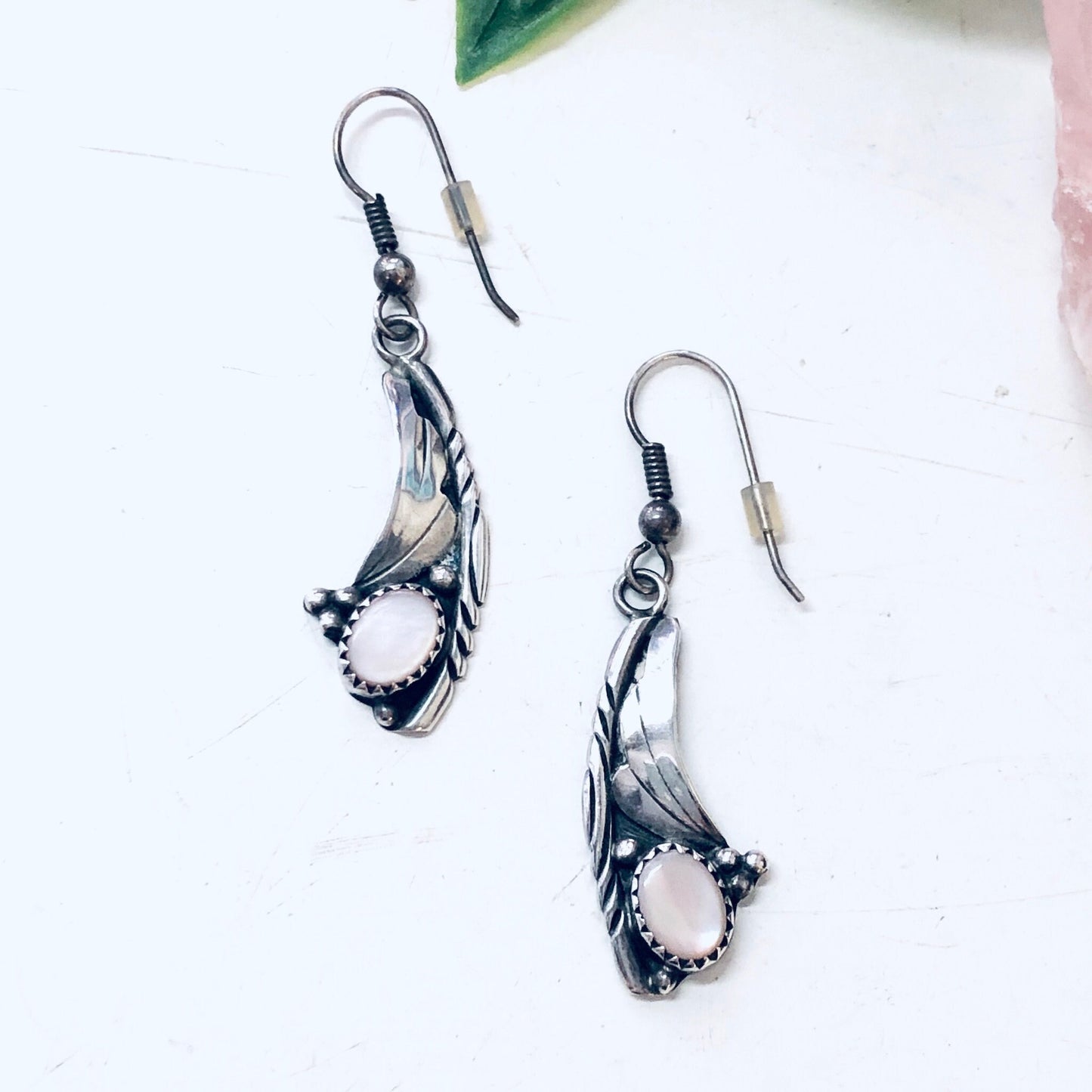 Vintage silver dangle earrings with mother of pearl accents in a Southwestern bohemian style, designed for pierced ears.