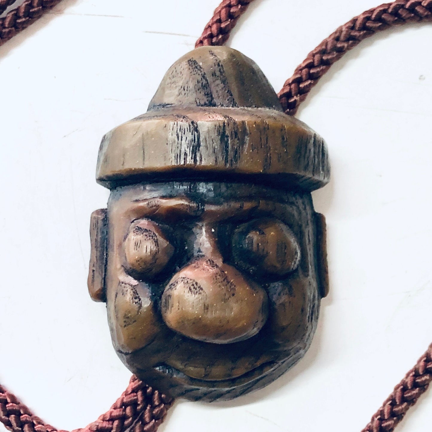 Vintage Japanese wooden carved face bolo tie with brown rope necklace