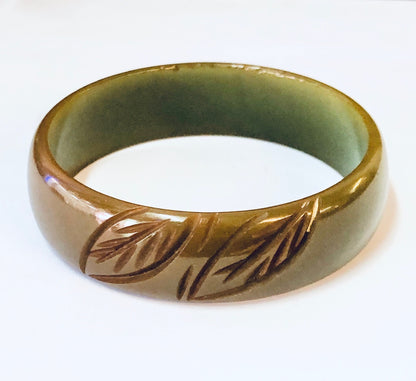 Vintage green and brown Bakelite bangle bracelet with etched leaf pattern