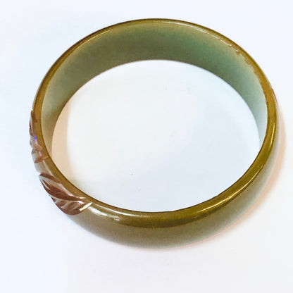 Vintage green and brown Bakelite bangle bracelet with leaf etching design