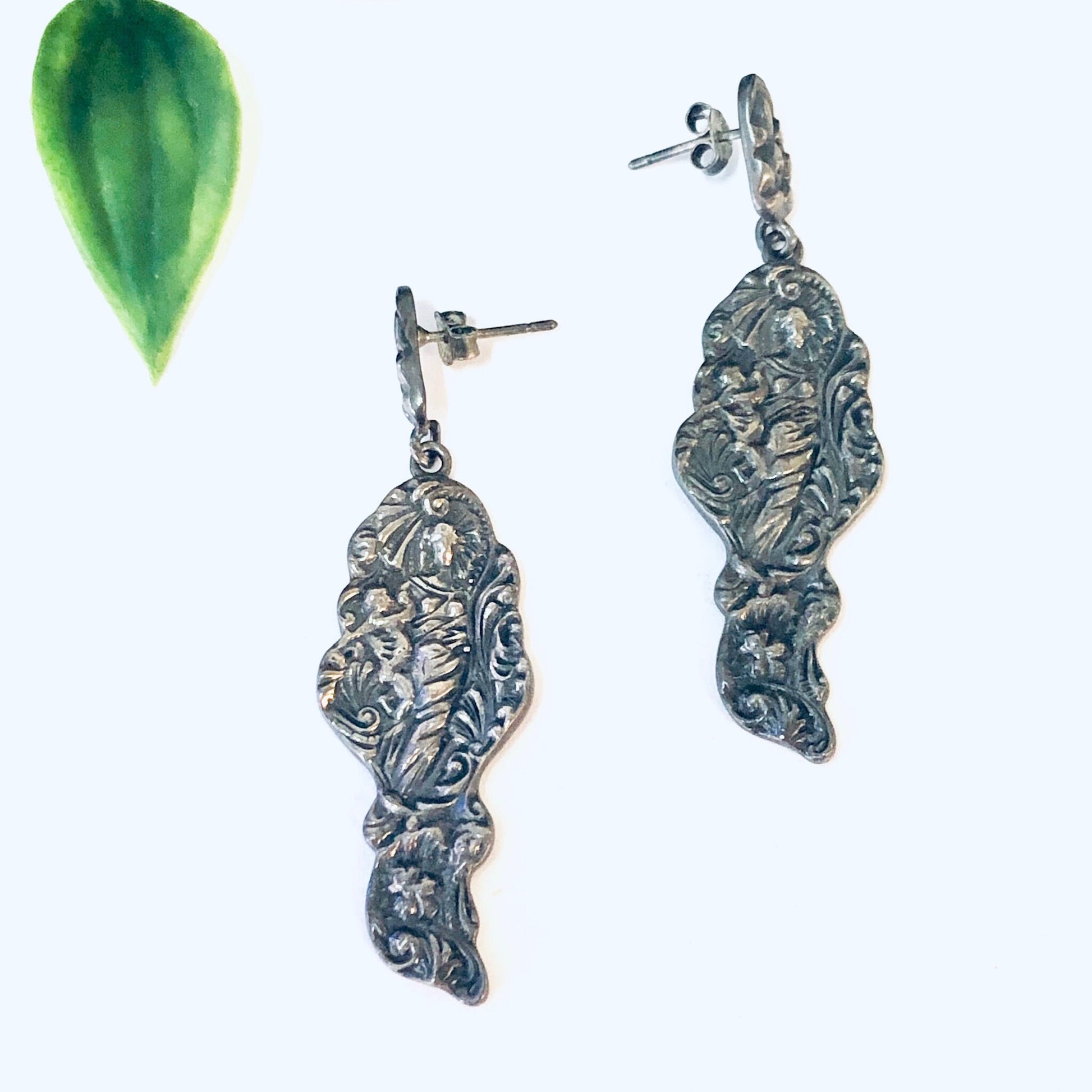 Vintage silver art nouveau style lady dangle earrings with green leaf accent