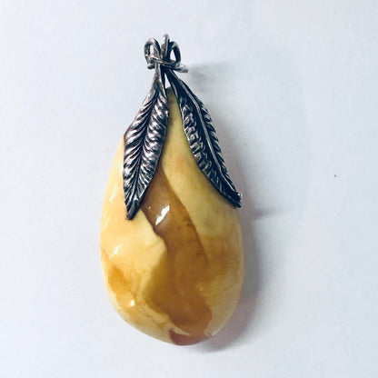 Vintage butterscotch amber pendant with silver feather accents, milky yellow amber teardrop jewelry necklace