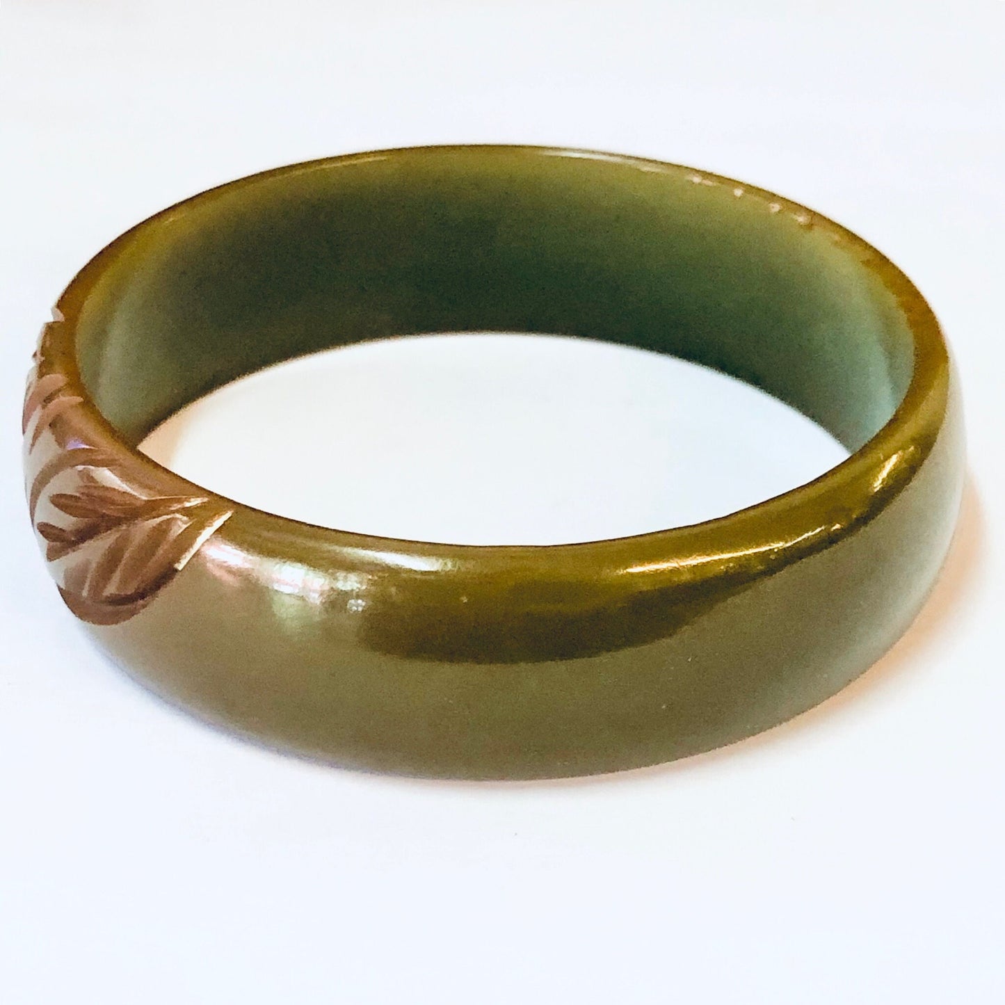 Vintage green and brown Bakelite bangle bracelet with leaf etching design