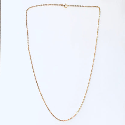 Gold chain necklace isolated on white background