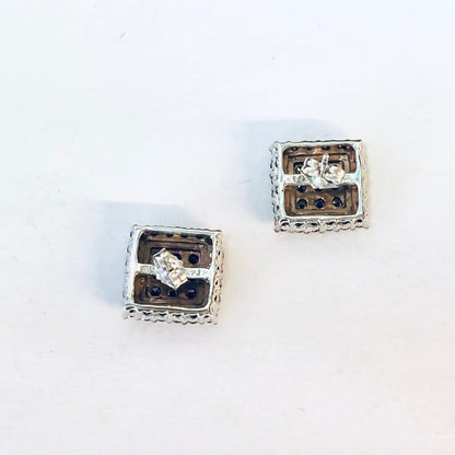 Vintage 10K gold diamond cluster earrings in Art Deco style, featuring a square stud design with prong-set diamonds and an openwork frame.