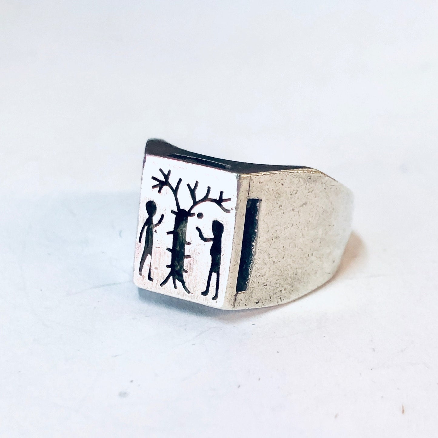 Vintage silver ring depicting Adam and Eve standing by the Tree of Life, a unique piece of religious jewelry from the 925 silver collection.